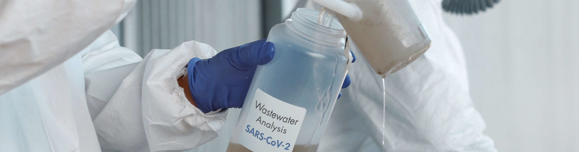 Female scientists working with waste water